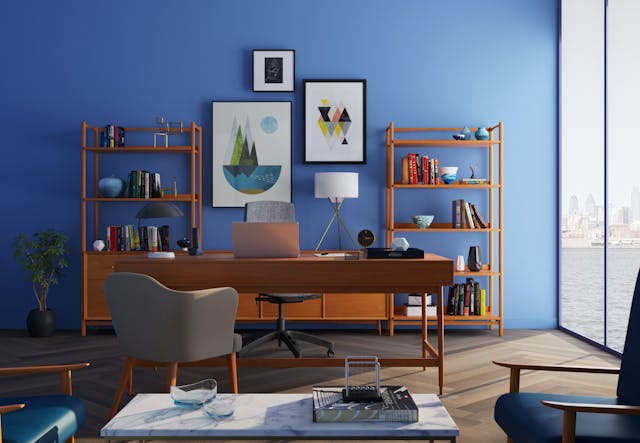 blue office with wood desk